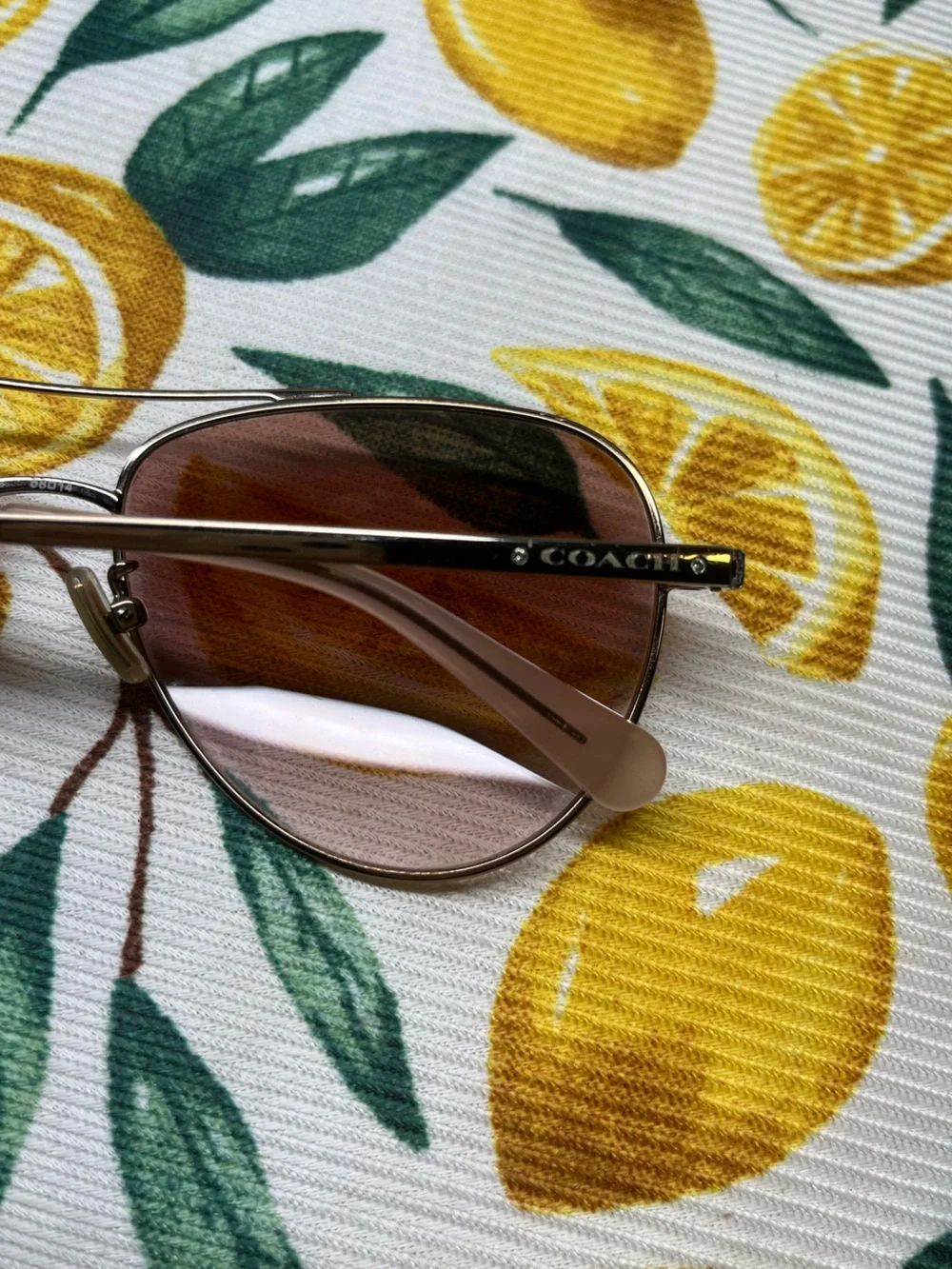 Coach Rose Gold Aviator Sunglasses with Pink Gradient Lenses